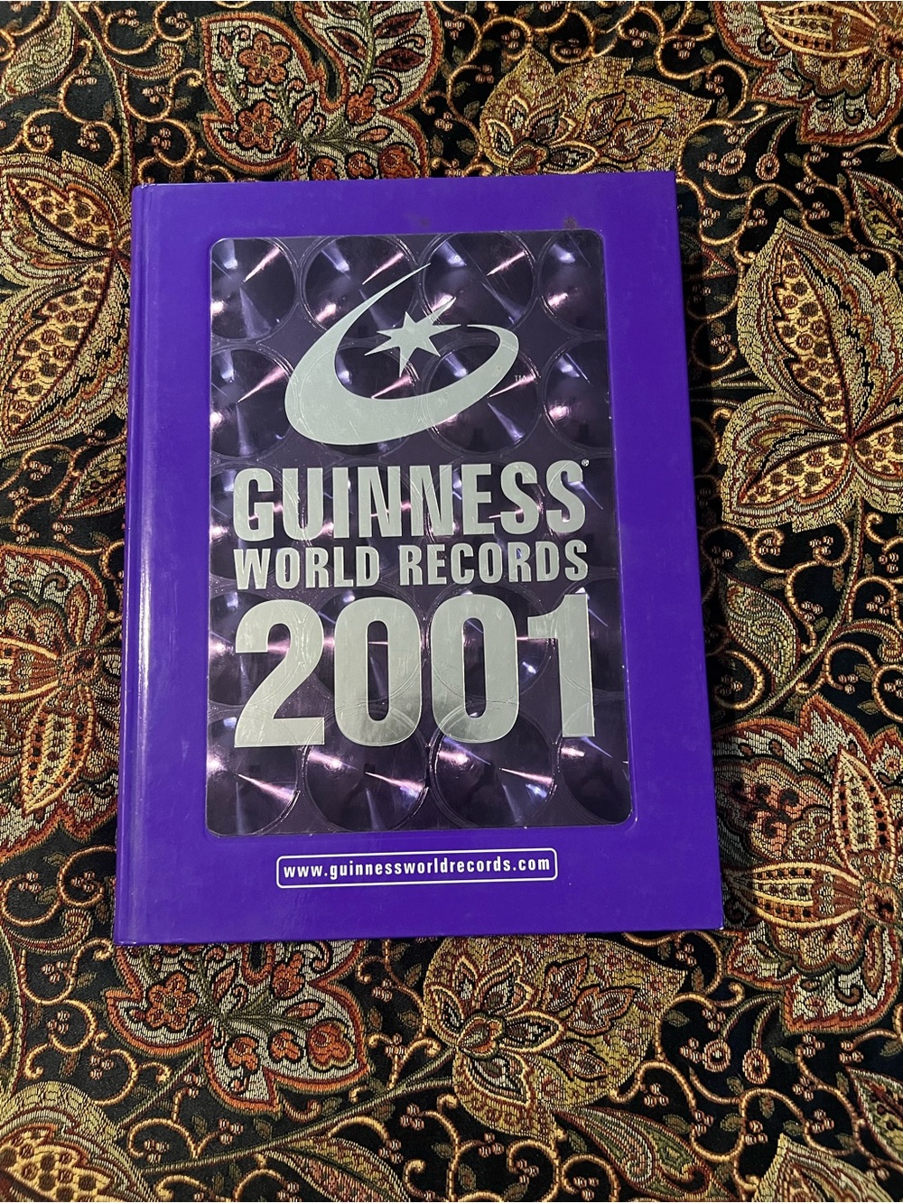 Guinness Purple Hardcover with Silver Logo and 2001